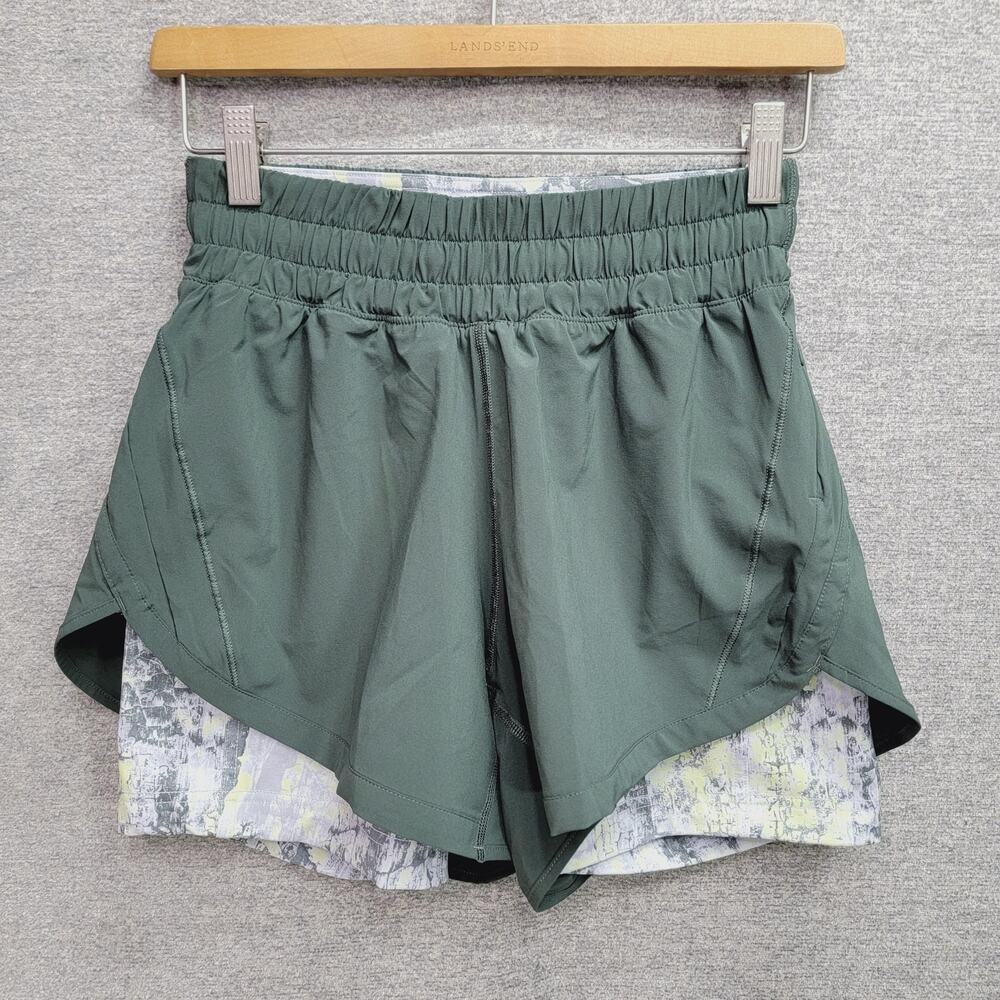 LULULEMON TRACK THAT 2 IN 1 HIGH RISE SHORT, SIZE 6.